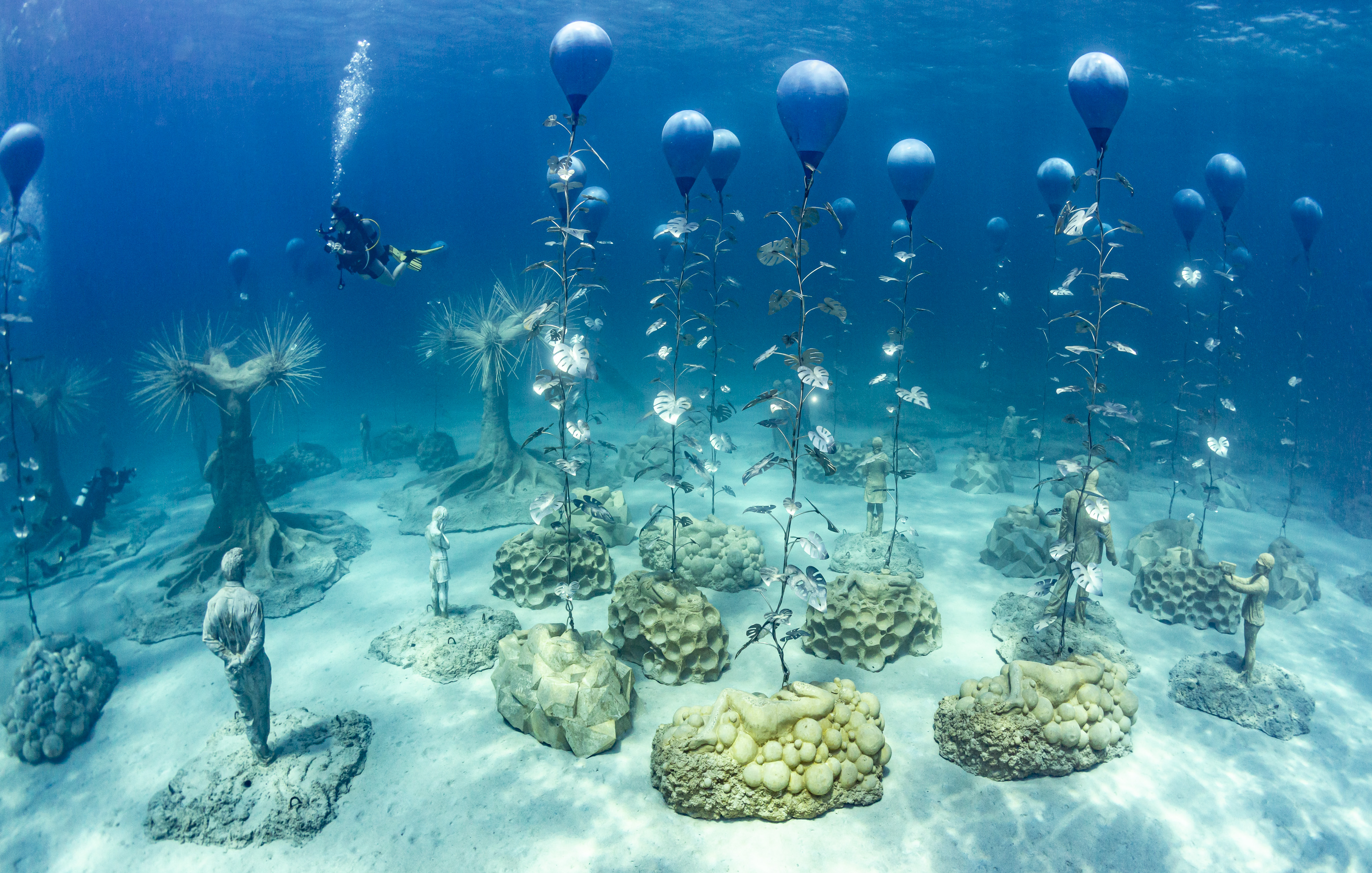 Diver explores the sculptural installation, MUSAN, Cyprus. Photo by Andrey Bizyukin