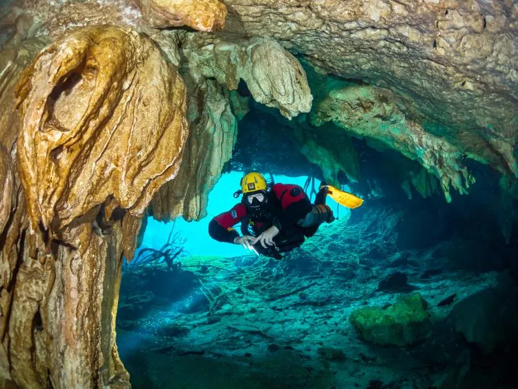 Cave diver with rebreather